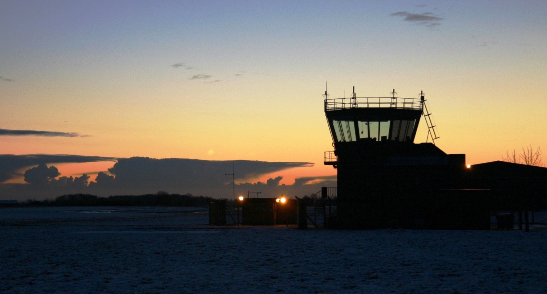 An ATC tower at dusk.