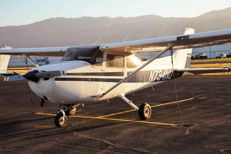 Cessna 172 Skyhawk parked at an airport, a great private plane for a general aviation pilot.
