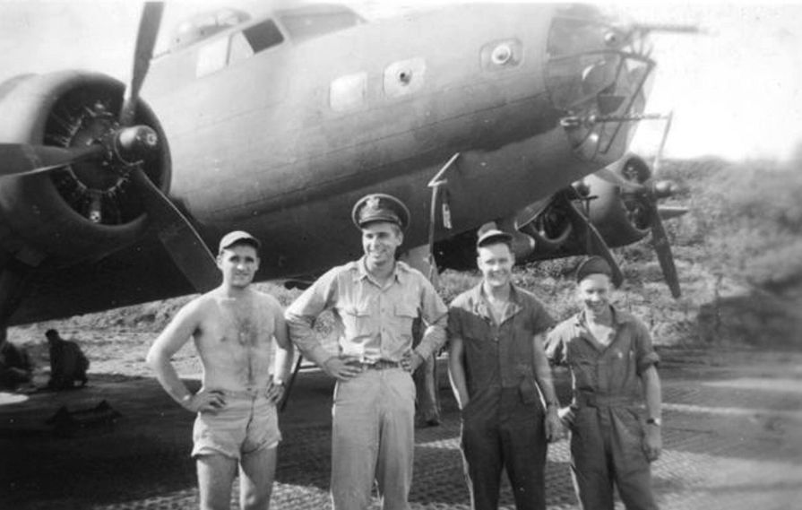 Gene Roddenberry and his flight crew stand in front of a B-17 Flying Fortress, during World War 2.