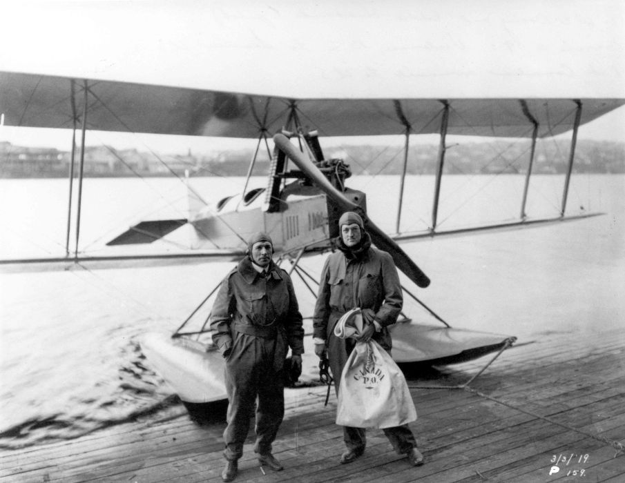 William Boeing and Eddie Hubbard in front of an aircraft, in 1919.