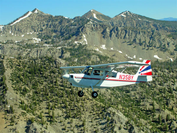 A private pilot flying an American Champion Decathlon in the backcountry
