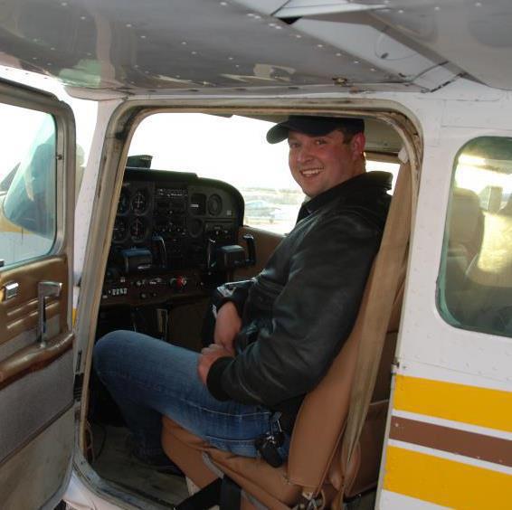 A private pilot sitting in the cockpit of a Cessna 172 - Learning to Fly With the Slovenly Pig