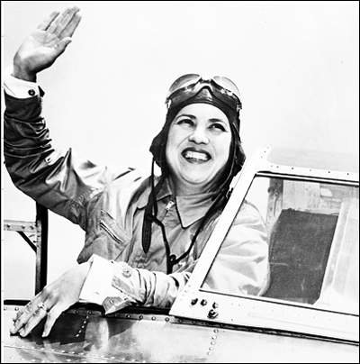 Jackie Cochran in an airplane cockpit