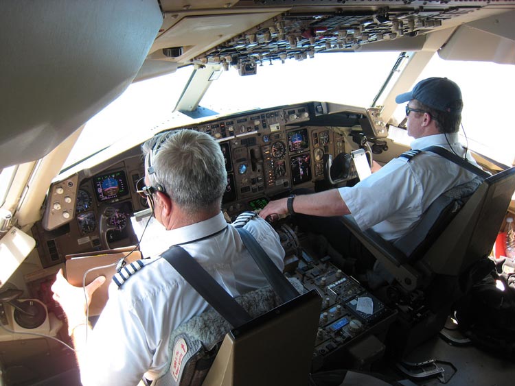Pilot and co-pilot in the cockpit of a 767