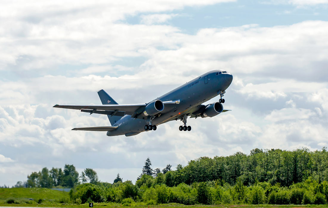 A 727-2C, part of the Boeing KC-46 test fleet, taking off for its first test flight
