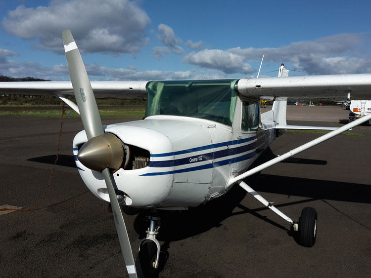 Cessna 152 airplane in transient parking