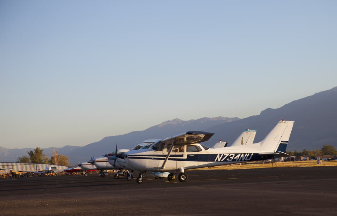 A collection of general aviation aircraft on the runway - FAA To Offer GA Pilots Rebate For Purchasing ADS-B Out Avionics