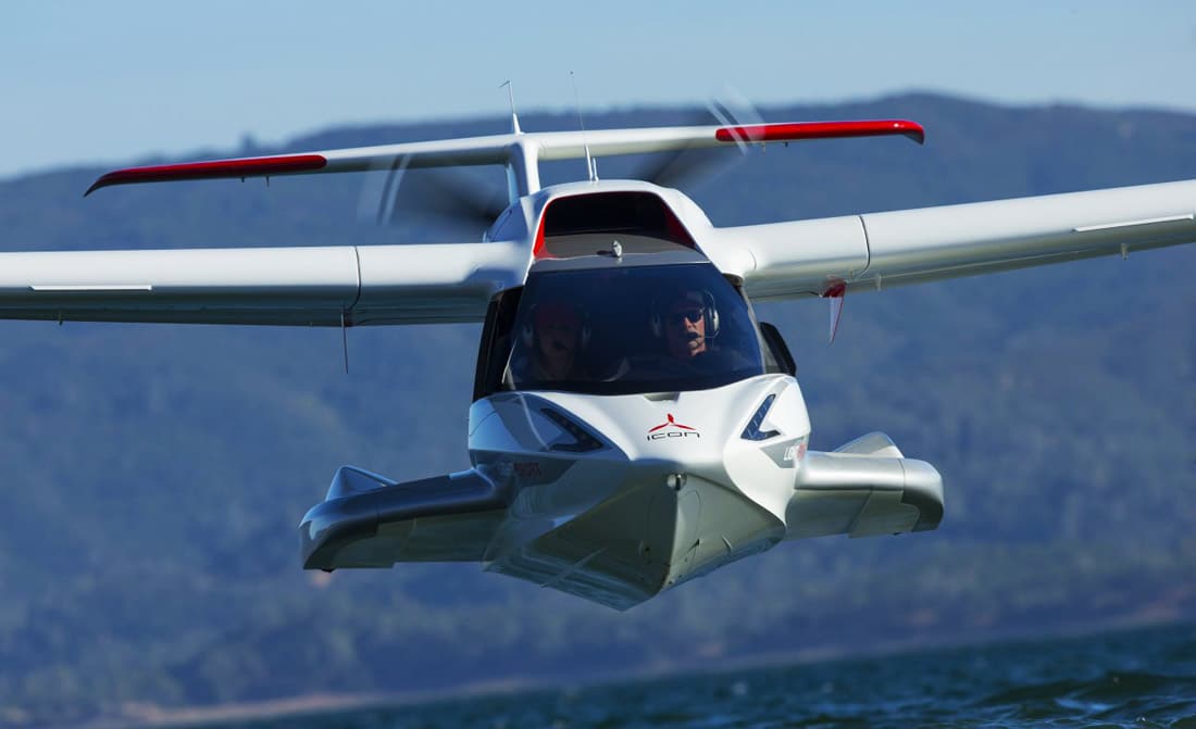 An A5 light sport aircraft from ICON Aircraft in flight over the water