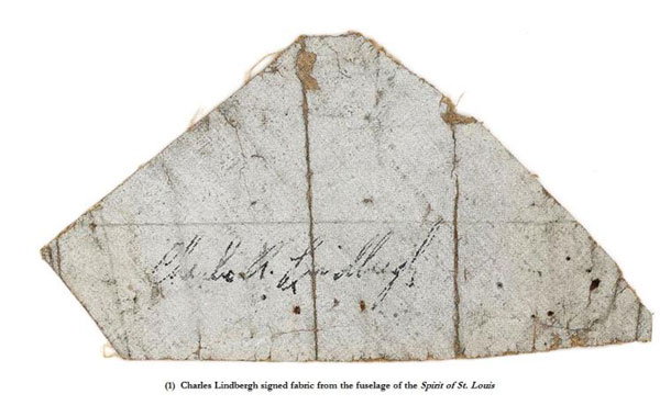 Piece of fabric from the airframe of The Spirit of St Louis, signed by Charles Lindbergh