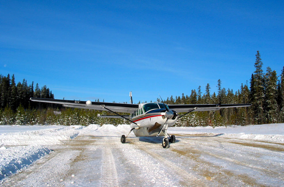 Cessna Caravan on a snowy runway - FAA Works to Improve Reporting on Runway Conditions