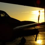 An aircraft in a hangar at sunset - New HangarBot system revealed to help secure hangars