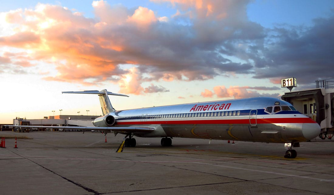 American Airlines flight on the ground at an airport - DOT fines American Airlines for Excessive Tarmac Delays