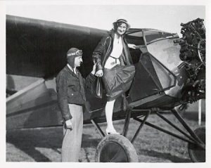 edwin albert link and his wife marion boarding a plane