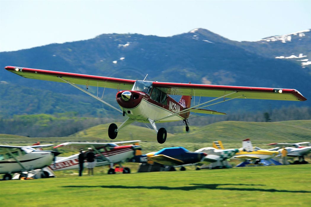 Savannah Hoff (Bob's granddaughter) taking off from the Smiley Creek in an Aviat Husky, Idaho airstrip.