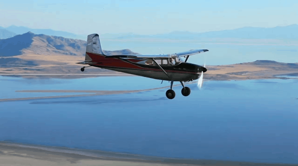 A n aircraft flying over the Great Salt Lake - Aerodynamics and the Four Forces