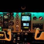 The instrument panel of a Beechcraft A36 Bonanza at night, ready for instrument flying.