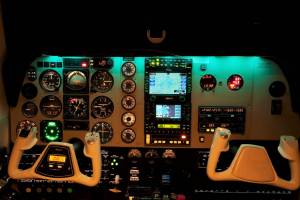 The instrument panel of a Beechcraft A36 Bonanza at night, ready for instrument flying.