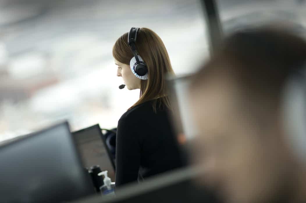A female air traffic controller at work - FAA Hiring Scandal Follow Up