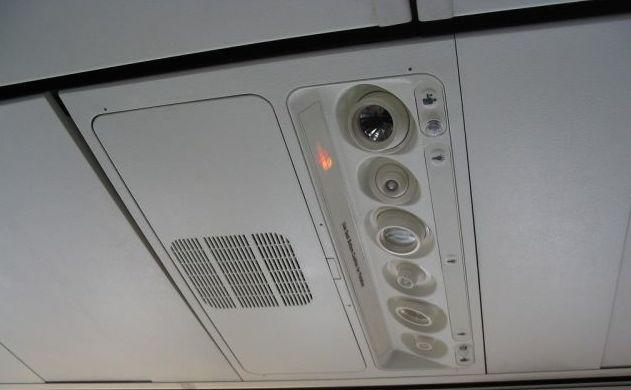 Airline oxygen vents in the ceiling - Airline Secrets Revealed - What Every Passenger Should Know