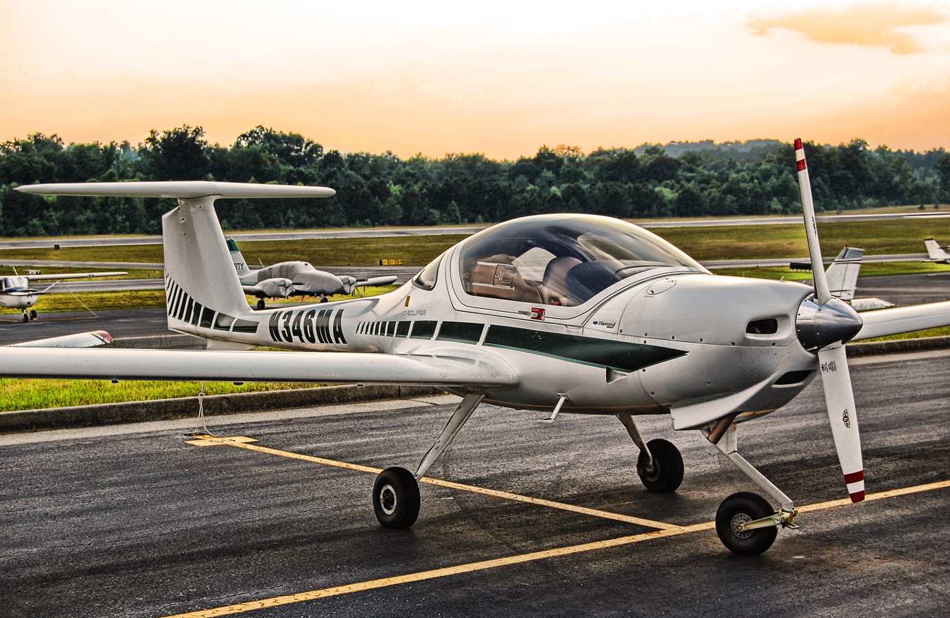 A Diamond DA20 Katana parked at the airport.