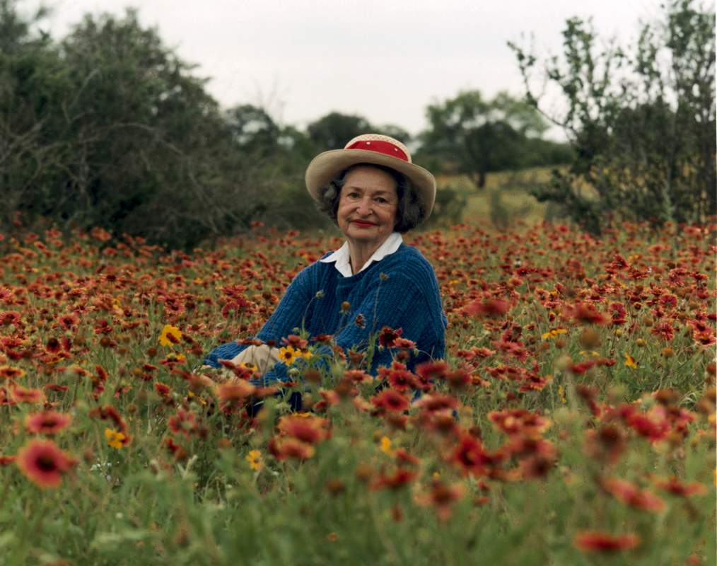 Lady Bird Johnson, the First Lady, among wildflowers near Fredericksburg TX.