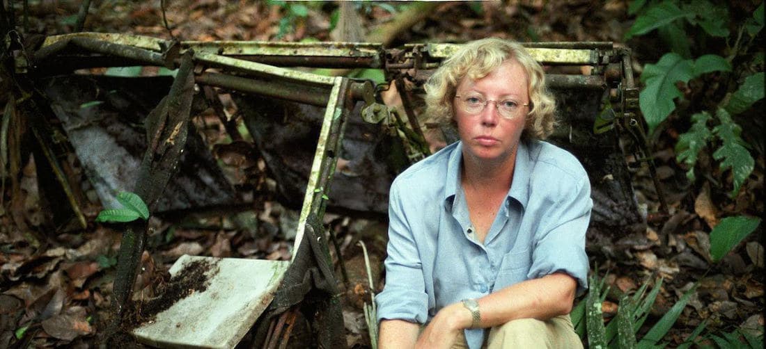 Juliane Koepcke next to aircraft wreckage in the jungle