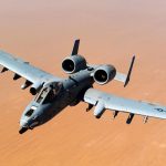The A-10 Thunderbolt II, or A-10 Warthog, in flight above the Afghanistan desert