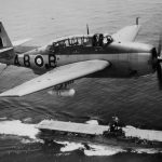 A Grumman Avenger flying over HMS Magnificent - Missing TBM-1C Avenger Discovered After 72 Years