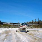 Cessna Caravan on a snowy runway - FAA Works to Improve Reporting on Runway Conditions