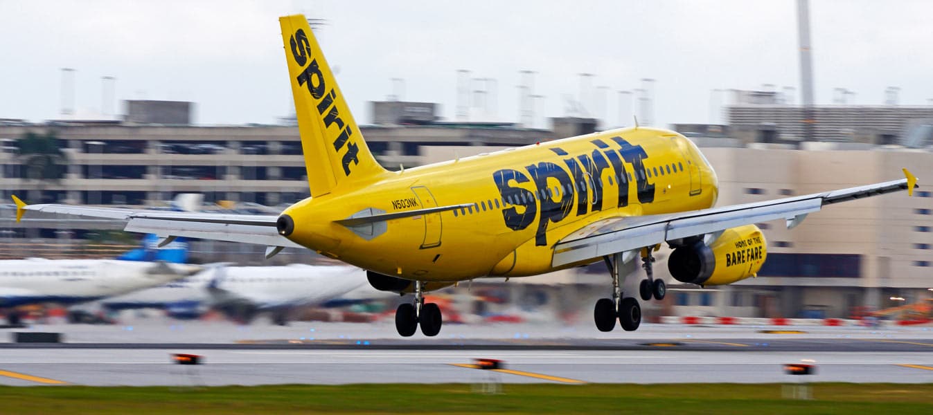 Spirit Airlines jetliner landing - Spirit Airlines Pilots Request Mediator In Contract Negotiations