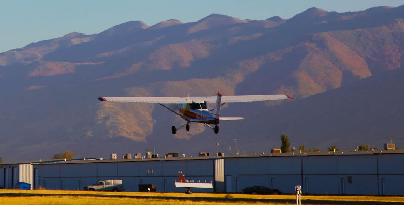 Cessna 150 taking off from airport - AOPA Nall Report Reveals General Aviation Safety Milestone