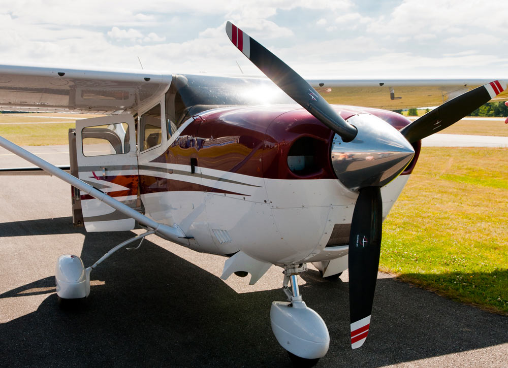 Cessna 210 aircraft on the runway - FAA Releases Final ECi Engine Cylinder AD