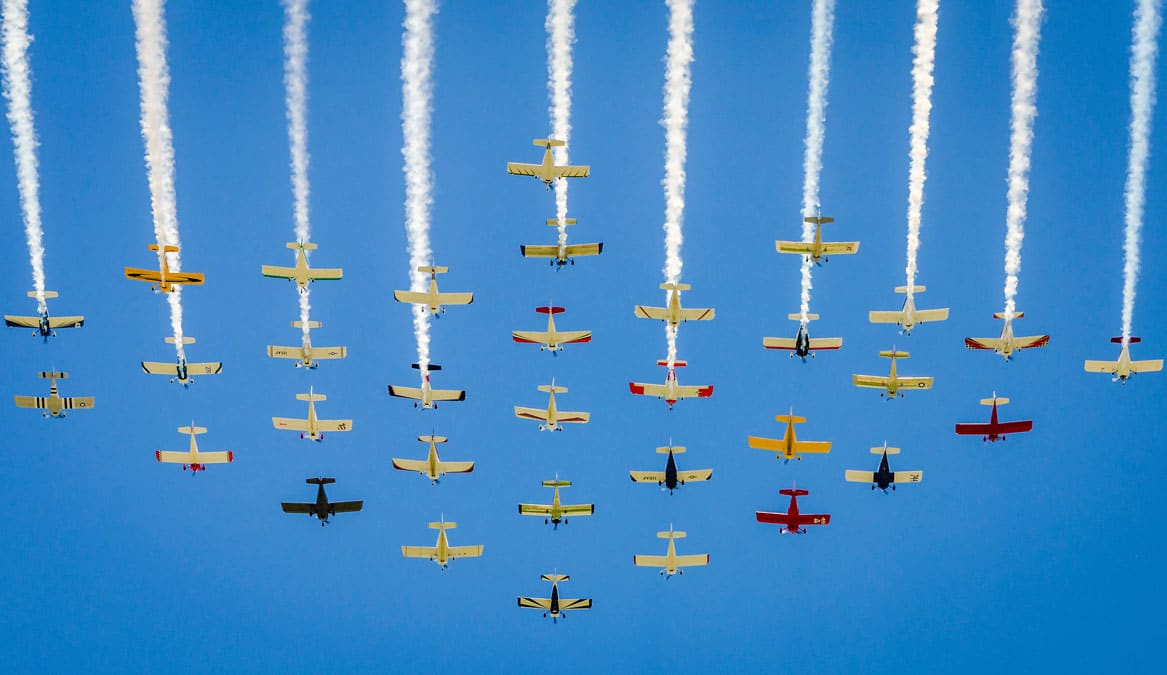 Aircraft flying in formation at EAA AirVenture 2016