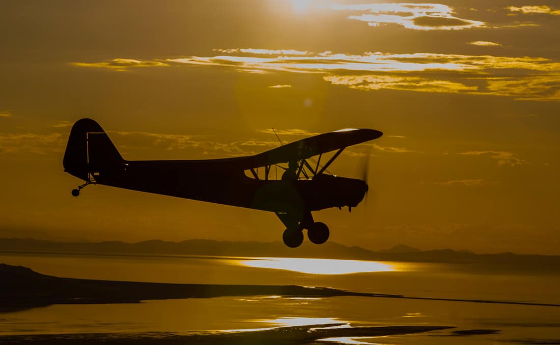 A general aviation pilot flying a Piper PA-11