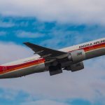 An Angola Airlines Boeing 777 - Angola Airlines Flight DT6544 makes emergency landing to free baggage handler from cargo area