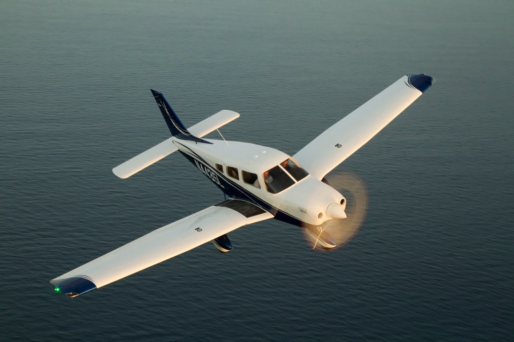 Piper Archer in flight, which is now certified for use with the Garmin G1000 NXi Integrated Flight Deck