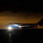 United Airlines Boeing 747 aircraft on the runway at night