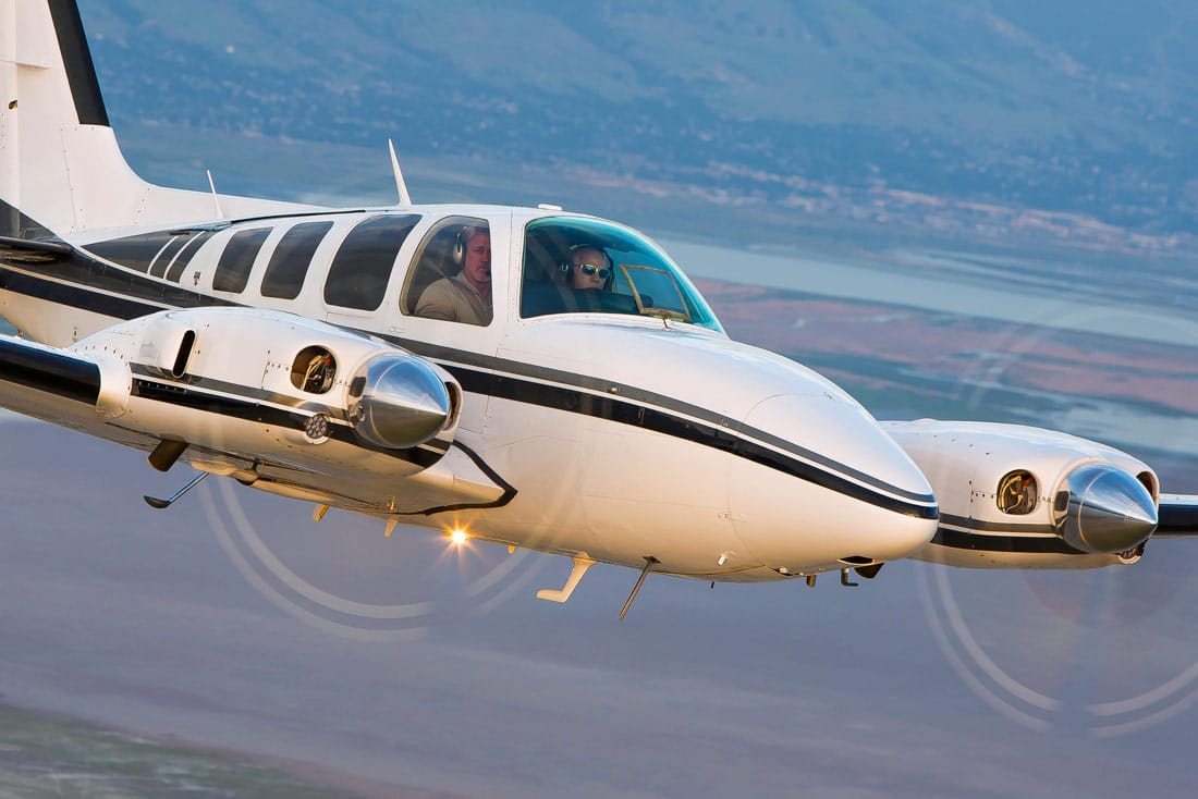 Beechcraft Baron 58 in flight - The 58TC model