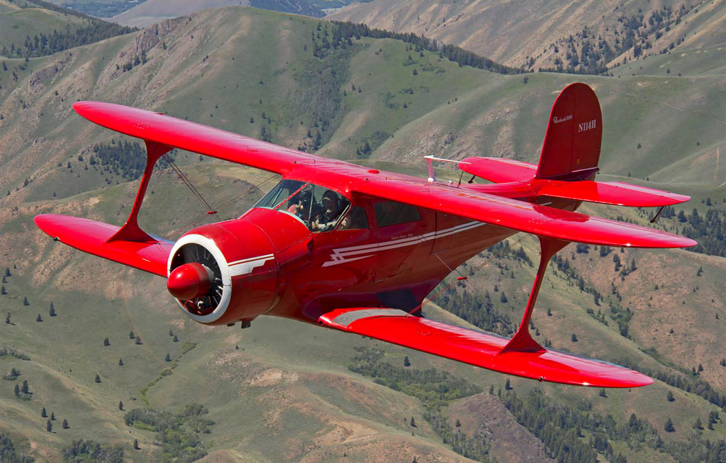 Beechcraft Model 17 Staggerwing in flight. 