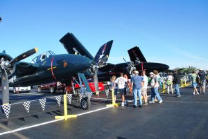 airshow pilot surrounded by fans