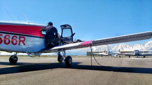 bryan and russ chatting inside a piper cherokee