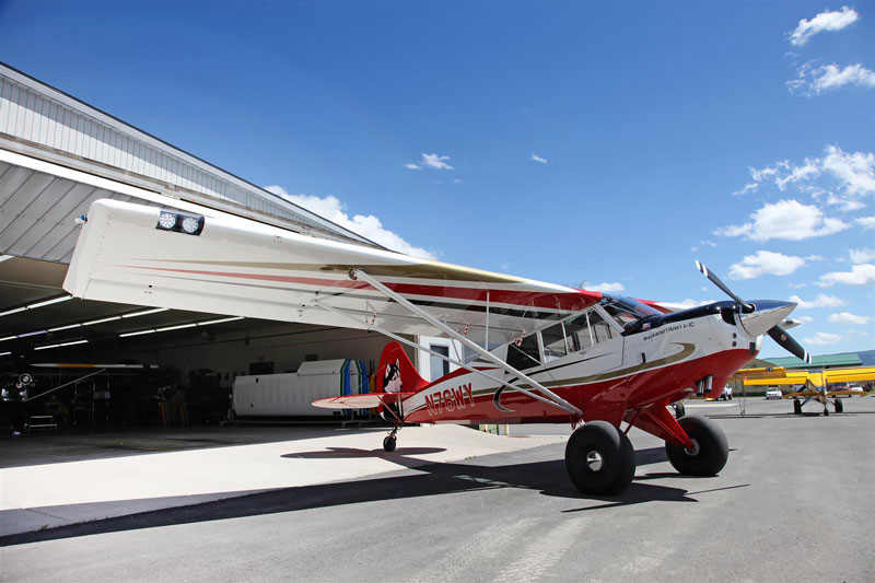 A brand new Aviat Husky rolls out of the factory in Afton, Wyoming.