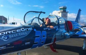 student pilot sitting in a l-39 albatros fighter jet at the reno air races night flight