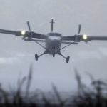 A Twin Otter landing in a storm, featured in 'Pounding Rain, No Visibility, Turbulence, and an Airplane Fire'