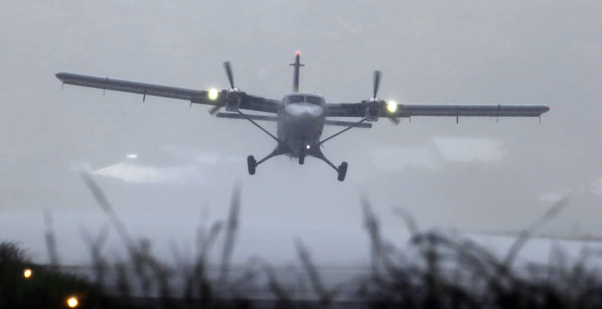 A Twin Otter landing in a storm, featured in 'Pounding Rain, No Visibility, Turbulence, and an Airplane Fire'